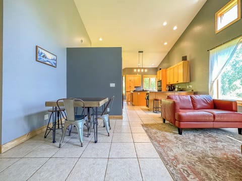 Breakfast table leading into the kitchen.