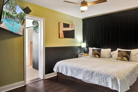A plush king bed & smart TV are available in the bedroom retreat​