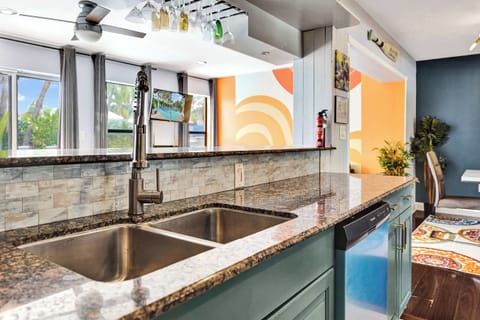 Unit 1’s inviting kitchen is well equipped for an unforgettable getaway​​
