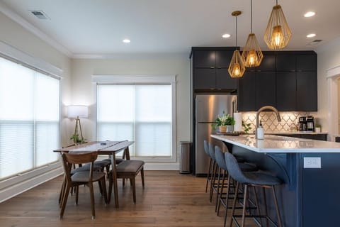 Open concept kitchen and dining space with seating for groups and gatherings