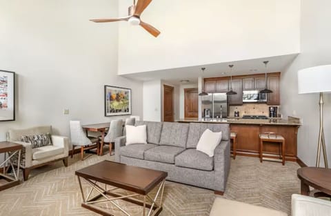 open concept kitchen, queen sleeper, bar and dining area, fireplace