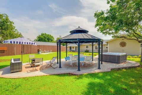 Huge backyard entertainment paradise! There are lights under the gazebo and around the pathways & a few flood lights in the back yard. WIFI reaches to the gazebo outdoor workspace, desk, outdoor office space. 