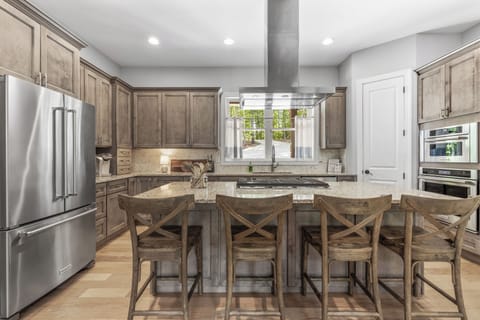 Kitchen is stocked with all you need for cooking, eating and entertaining.