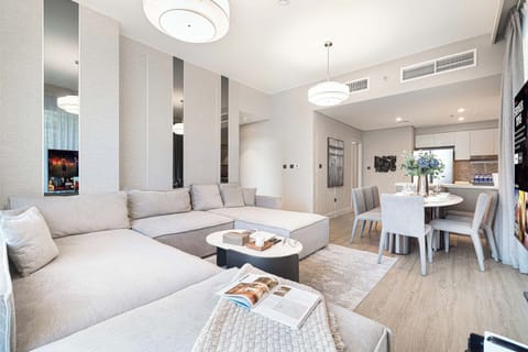 Spacious living room with HD TV, PS5, and classic games for endless fun