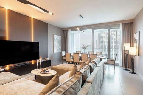 Spacious living room with floor-to-ceiling windows