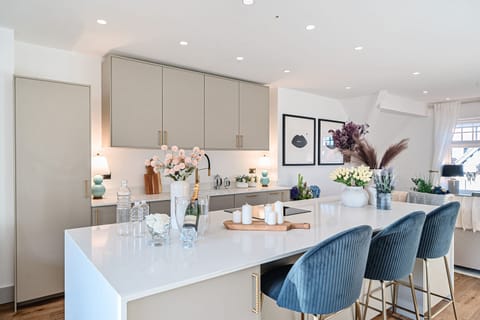Elegant dining space with a luxury kitchen island.