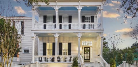 Step into timeless elegance at this grand coastal retreat, where wraparound porches, glowing lantern light, and historic charm set the tone for your stay. Sip wine on the balcony, gather with friends, and experience Galveston the way it was meant to
