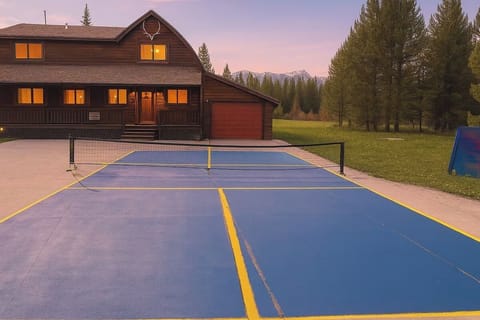Private pickleball court with mountain views, steps from the cabin.