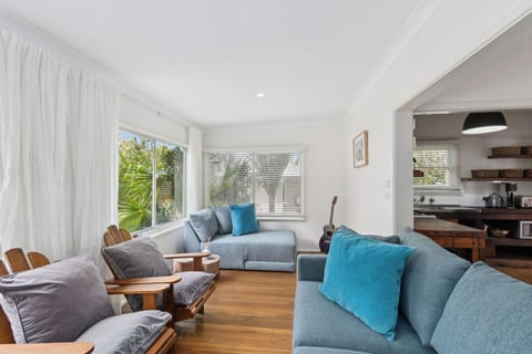 Begin your day in the tranquil corner, where lush palms just outside the windows create a soothing backdrop for reading, journaling, or slow mornings with coffee.
