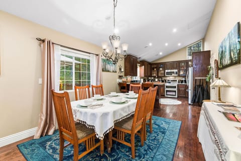 Additional dining space between the living room and kitchen.