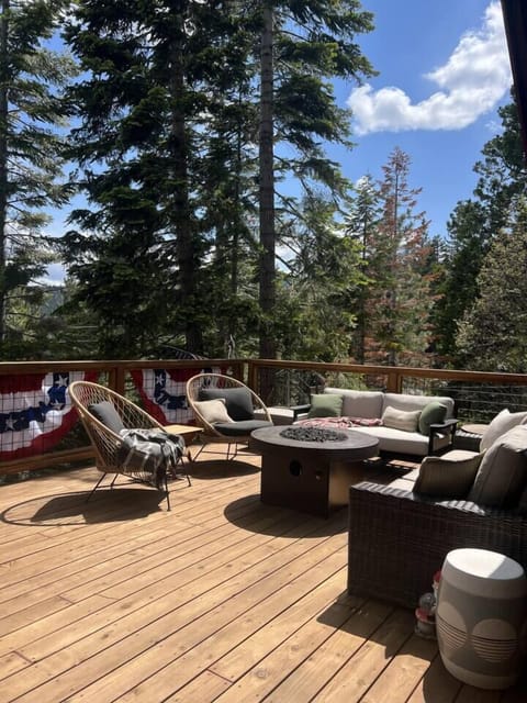 Spacious outdoor deck for morning coffee or evening drinks, set among the trees with a quiet, tucked-away Tahoe setting.