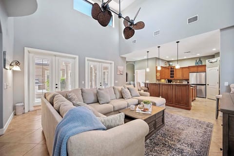 Living Room with Comfortable Couch Connects with the Kitchen