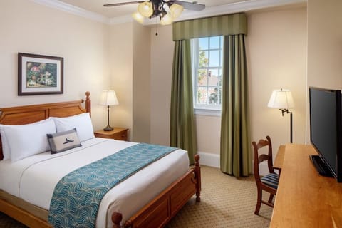 Settle in with a serene king bed and a dedicated workspace.