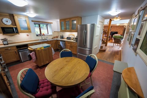 Round 4 place breakfasting table, doesn't look big but big enough.