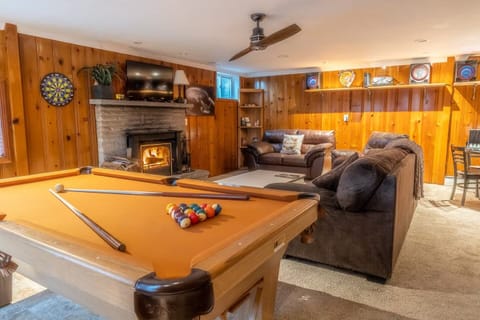 Game room, complete with Playstation, Pool Table and a working wood fireplace