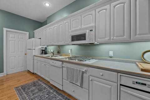 Fully-equipped modern kitchen with stainless appliances, ample counter space, and everything you need to prepare delicious meals during your stay.