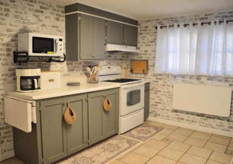 Kitchen with fold away countertops for extra counter space