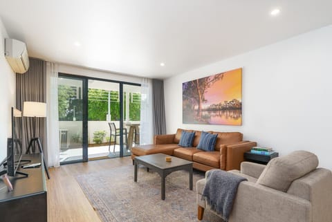 Sink into the comfortable lounge and make yourself at home — a cosy spot to read, watch a movie, or simply relax after exploring the area.