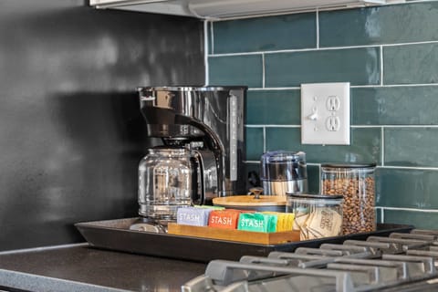 Coffee and Tea Station with first round of beans, creamers, tea bags