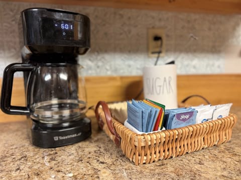 Ground coffee pot (coffee grinds and tea for your stay 