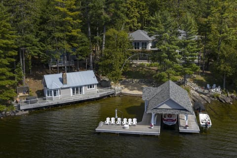 Secluded lakeside retreat with private dock and boathouse