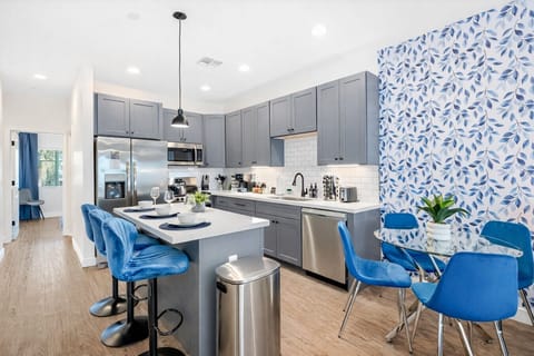 Expansive open layout where the kitchen, dining, and living spaces flow together.