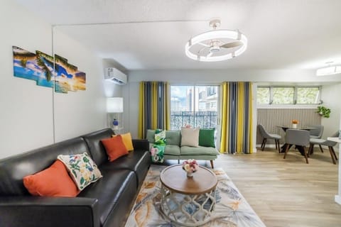 Living room with a queen size sofa bed and a futon