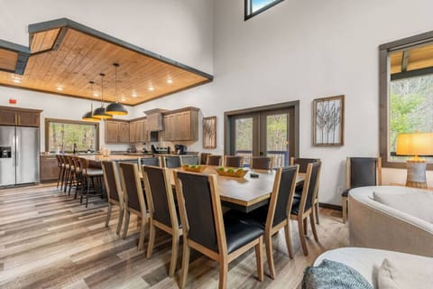 With room for everyone to sit, laugh, and dine together, this inviting space blends seamlessly into the kitchen—perfect for holidays or weeklong stays.