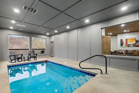 Take a dip any time of year in your private indoor pool—kick back with a drink in hand, take in the wooded views, and enjoy the ultimate in-cabin luxury.