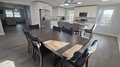 Large sunny kitchen and eating room - open to living room - table with 8 chairs