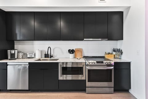 Fully equipped, modern-appliance kitchen for all of your cooking needs! Keurig machine + K-cups provided. Seating for 2 at the high-top table, and seating for 6 at the dining table.