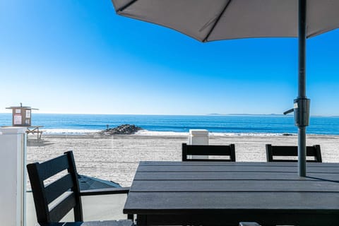 Oceanfront balcony with unobstructed views of iconic 48th Street Beach, your private front-row seat to the Pacific
                