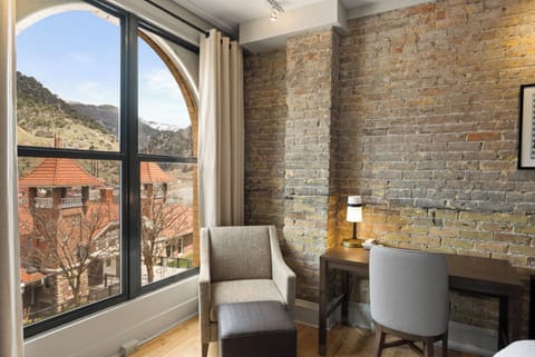 Sip coffee by the window with a quiet reading chair.