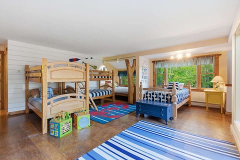 Bedroom 7 with 10 singles is the bunk room - Spacious family bunk room designed for fun, comfort, and making memories together.