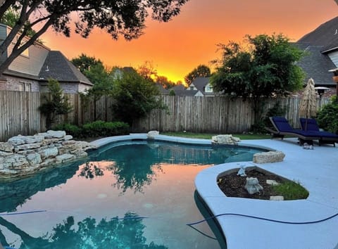 Pool with waterfall feature