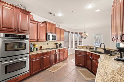 Fully equipped with cooking essentials and top-of-the-line appliances for all your cooking needs, this charming kitchen is missing only one thing – you!