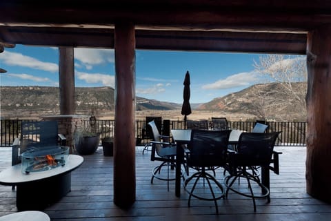 Amazing deck with views, hot tub, gas and wood buring fire pits, dining table, BBQ grill