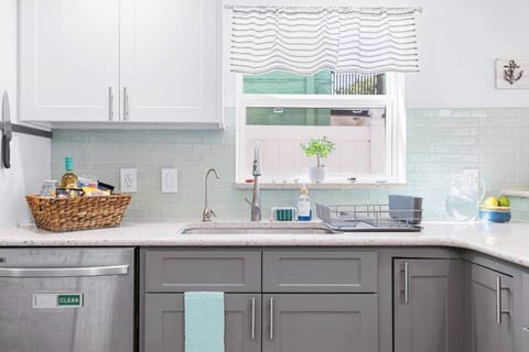 Dishwasher, Stove, Pots, Pans,  Liquid Dish soap,  Dishes, Coffee Cups,  Dish rack, Dishwasher