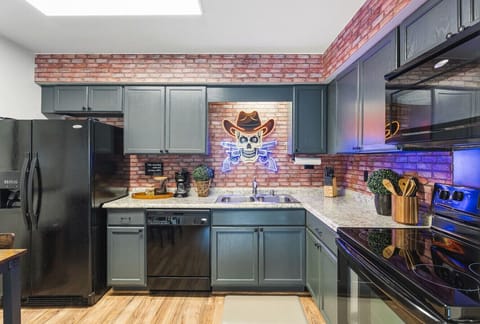 Fully equipped kitchen for all of your cooking needs! Dining table with seating for 4.