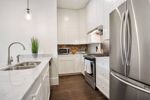 Unit B | Kitchen | Single Level Unit | Open to Dining and Living Areas