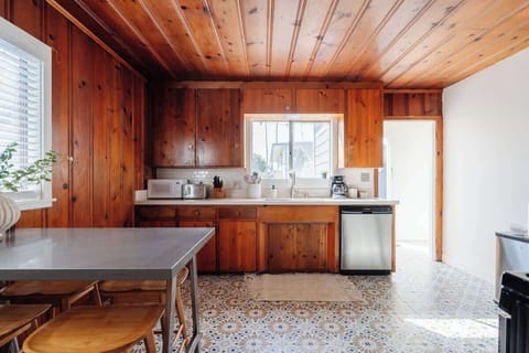 Whip up your favorite meals easily in our fully equipped and spacious main house kitchen.