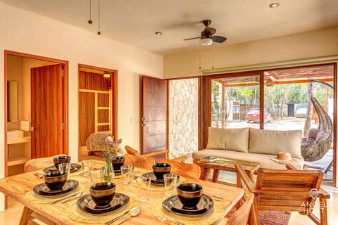 The wood touches make the space including the hand-made dining table for 6
