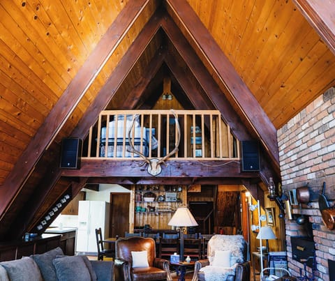 Cozy up in this stunning A-frame retreat- the perfect mountain hideaway