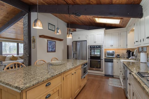 An inviting kitchen designed for gathering, cooking, and spending time together.