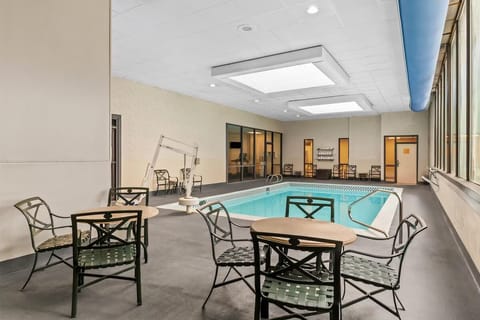 Unwind poolside with cozy seating and warm indoor comfort.