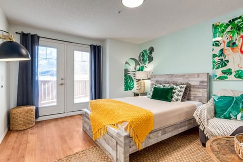 Laze into this bright and comfy bed after a long day of adventure!
