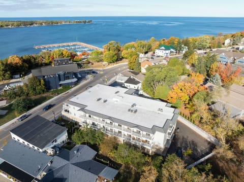 Aerial view showing the Penthaus at the very heart of downtown Egg Harbor, steps to the harbor, beach, marina, dining, and shopping