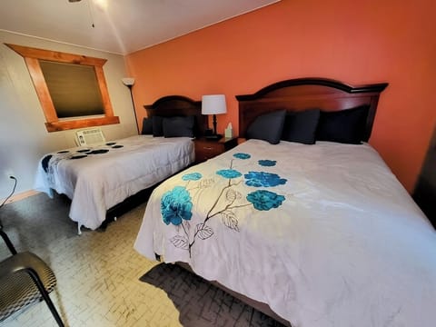 Unwind in a bright, spacious room with two comfy beds.