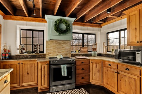 Wood beams, natural light, and a kitchen that wows