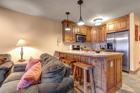The living area connects seamlessly to the open concept kitchen space.